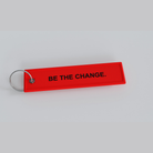 Be The Change Red Fury Keychain